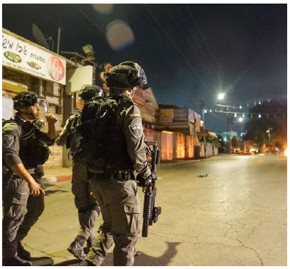 Israeli police patrol the streets of Lod in the central district of Israel during the conflict in May. (Photo: israel police)