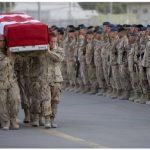 Canadians joined the U.S. war effort in Afghanistan in 2001. In all, 158 Canadian Armed Forces members lost their lives. Here, a Canadian honour guard carries the remains of Canadian army Pvt. Sebastien Courcy during a sundown ceremony at Kandahar Air Field. (Photo: Mass Communication Specialist 1st Class Chad J. McNeeley, U.S. Navy)