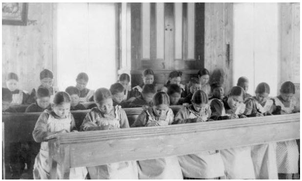 Shown here is study period at Roman Catholic Indian Residential School, Fort Resolution, Northwest Territories. The latest residential school scandal made headlines across the globe, and China weaponized it in its dealings with Canada. (Photo: Library and archives Canada)