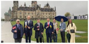 The embassies of Latvia and Lithuania hosted a Balts Unity Day celebration. From left: Latvian Ambassador Karlis Eihenbaums; Lithuanian Ambassador Darius Skusevicius; Polish Ambassador Andrzej Kurnicki; Ukrainian minister-counsellor Andrii Bukvych; Antoine Pouliot, desk officer for Estonia, Latvia and Lithuania at Global Affairs Canada; Paul Laanemets, member of the Estonian Central Council in Canada; and Hélène Cayer, Algonquin woman and member of the Friends of Library and Archives Canada. (Photo: Ülle Baum)