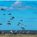 Army paratroopers jump into a drop zone during Exercise Talisman in Queensland, Australia, in July 2021. The exercise addresses the full range of potential security concerns in the Indo-Pacific. (Photo: US defense photo)