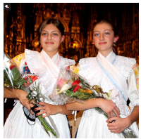 From left, Terezia Koziakova and Sabina Koziakova, daughters of Slovakian Ambassador Vit Koziak, performed three Slovakian Christmas songs at the EU concert. They are wearing traditional handmade costumes decorated with embroidery done using a “curved needle” technique. (Photo: Ülle Baum) 