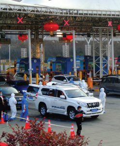 China’s role in the COVID-19 pandemic 1 “Epidemic prevention” measures at Qujiang Toll Station in Yanta District, Xi’an, are shown here. The first cases of COVID-19 were reported in Wuhan, China. (Photo: Liuxingy)