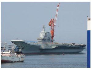 China’s role in the COVID-19 pandemic 6 While the U.S. navy was fighting COVID-19, the Chinese sortied their aircraft carrier Liaoning, shown here, and her escorts through Taiwanese waters in April and May out into the Western Pacific. (Photo: Tyg728)