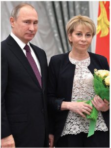 Elizaveta Glinka, shown here with Russian President Vladimir Putin, was known as  “Dr. Liza.” She was a medical professional who reintroduced the notion of charitable acts to a populace that had relied on the state for its needs over decades. Her story ended tragically, however. (Photo: Kremlin.ru)