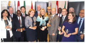 Also at the awards, from left, Paraguayan Ambassador C. Ines Martinez Valinotti, retired Canadian diplomat Lawrence Lederman, Kenyan High Commissioner John Lepi Lanyasunya, then-Korean ambassador Maeng-ho Shin, Moldovan Ambassador Ala Beleavschi, Pierre Thibault, Cuban Ambassador Josefina de la Caridad Vidal Ferreiro, Indonesian Ambassador Abdul Kadir Jailani, chief of protocol Stewart Wheeler, Anu’ A-Gheyle Azoh-Mbi, Tunisian Ambassador Mohamed Imed Torjemane, Cypriot Ambassador Vasilios Philippou. Honduran Ambassador Sofia Cerrato and Yemeni Ambassador Jamal Abdullah Yahya Al-Sallal at the ceremony. (Photo: Ülle Baum) 