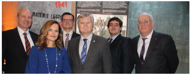 Latvian Ambassador Karlis Eihenbaums hosted the opening of the exhibition “The Latvian Tragedy 1941” at the Canadian War Museum. From left: Jeff Mierins, Latvian-Canadian entrepreneur and president and founder of ColdWarCollection.com; Caroline Dromaguet, acting director-general of the Canadian War Museum; Janis Garisons, state secretary of the Ministry of Defence of Latvia; Ambassador Eihenbaums; Ilya Lensky, director of the Latvian museum, Jews in Latvia; and Robert Austin, associate director of the Centre for European, Russian and Eurasian Studies at the University of Toronto’s Munk School of Global Affairs and Public Policy. (Photo: Ülle Baum) 