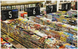 At the start of the pandemic, grocery workers became front-line workers and heroes for keeping the shelves stocked and food supplies moving. (Photo: Dreamstime | © anjelagr)