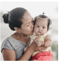 This mother and child in the Philippines benefit from Nutrition International’s programs. (Photo: nutrition international)