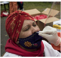 Doctors administer COVID tests on refugee women at a shelter in Ecuador, one of Latin America’s most COVID-affected countries. (Photo: UNHCR)