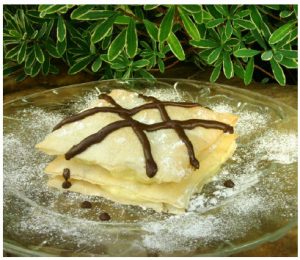 Warm meals for winter nights 3 Lemon Napoleons are one of Dickenson's signature recipes that have remained popular over the years, thanks to the tart curd layered between phyllo. (Photo: Larry Dickenson)