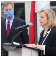 To mark the national day of Hungary and commemorate the Hungarian Revolution and Freedom Fight of 1956, Ambassador Maria Eva Vass-Salazar held a flag-raising ceremony at City Hall. She’s shown with Ottawa Mayor Jim Watson. (Photo: Ülle Baum)