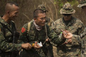 U.S. Marine 1st Lt. Mark Caldwell shares a meal with a Royal Thai Marine during exercise Cobra Gold 2020 in Thailand in March 2020. (Photo: U.S. Marine Corps photo by Staff Sgt. Jordan E. Gilbert)
