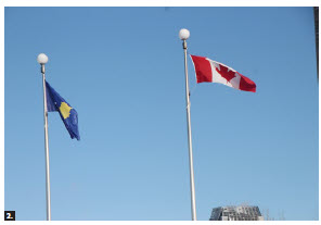 Kosovo Independence Day marks Kosovo's declaration of independence in 2008. In celebration of the 13th such day, Ambassador Adriatik Kryeziu hosted a flag-raising ceremony in front of Ottawa City Hall. The Kosovar flag is shown here, next to the Canadian flag. (Photo: Ülle Baum)