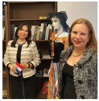 Paraguayan Ambassador Ines Martinez Valinotti, left, received book donations from Mayelinne De Lara, general director of the International Public Diplomacy Council at The Hague on the occasion of the inauguration of the library at the Paraguayan Embassy. (Photo: Ülle Baum) 
