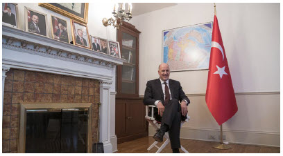 Turkey’s ambassador to Canada, Kerim Uras, poses in Take Your Seat’s chair following its latest Turkish expedition. 