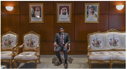 Fahad Saeed Al Raqbani, the UAE’s ambassador to Canada, takes his seat before Take Your Seat's National Day exhibition.