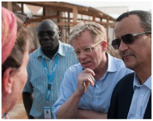 ‘These are always hard times. This is a Churchillian moment we're looking for here’ 2 Bruce Aylward (centre), visits Sierra Leone when he was assistant director general of the World Health Organization (WHO) in charge of the operational response on Ebola. He's shown with Ismail Ould Cheikh, special representative to the UN secretary general. (Photo: UN photo)