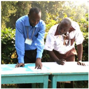 Two Life & Peace Institute representatives conduct inter-community dialogue in Democratic Republic of Congo. Author Séverine Autesserre lauds the organization’s work in that country. (Photo: Life & Peace Institute)