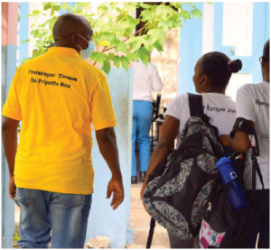A Little Footprints Big Steps staff member facilitates training on anti-violence and abuse prevention in a school. (Photo: Fransel Francois)