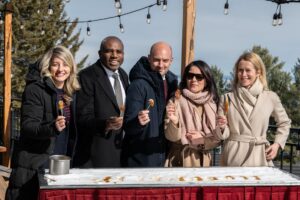 Foreign ministers enjoying traditional Canadian maple taffy on snow at a pre-G7 gathering in Kananaskis.